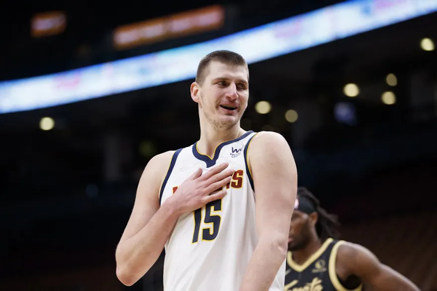 Nikola Jokic of the Denver Nuggets reacts during the second half of their NBA game against the Toronto Raptors at Scotiabank Arena on February 12, 2022 in Toronto, Canada.
