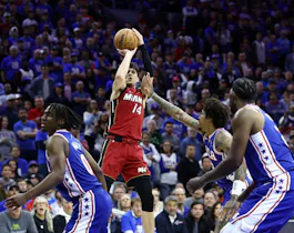 Tyler Herro of the Miami Heat shoots over Kelly Oubre Jr. of the Philadelphia 76ers during the fourth quarter of the Eastern Conference Play-In Tournament. We're backing Herro in our Bulls vs. Heat player props & odds.