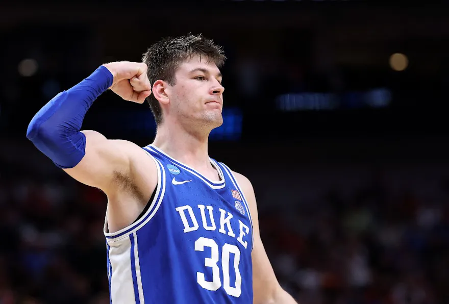 Kyle Filipowski of the Duke Blue Devils reacts after scoring during the second half of the Sweet 16 against the Houston Cougars, and we offer our top Elite Eight player props and best bets for Sunday based on the best March Madness odds.