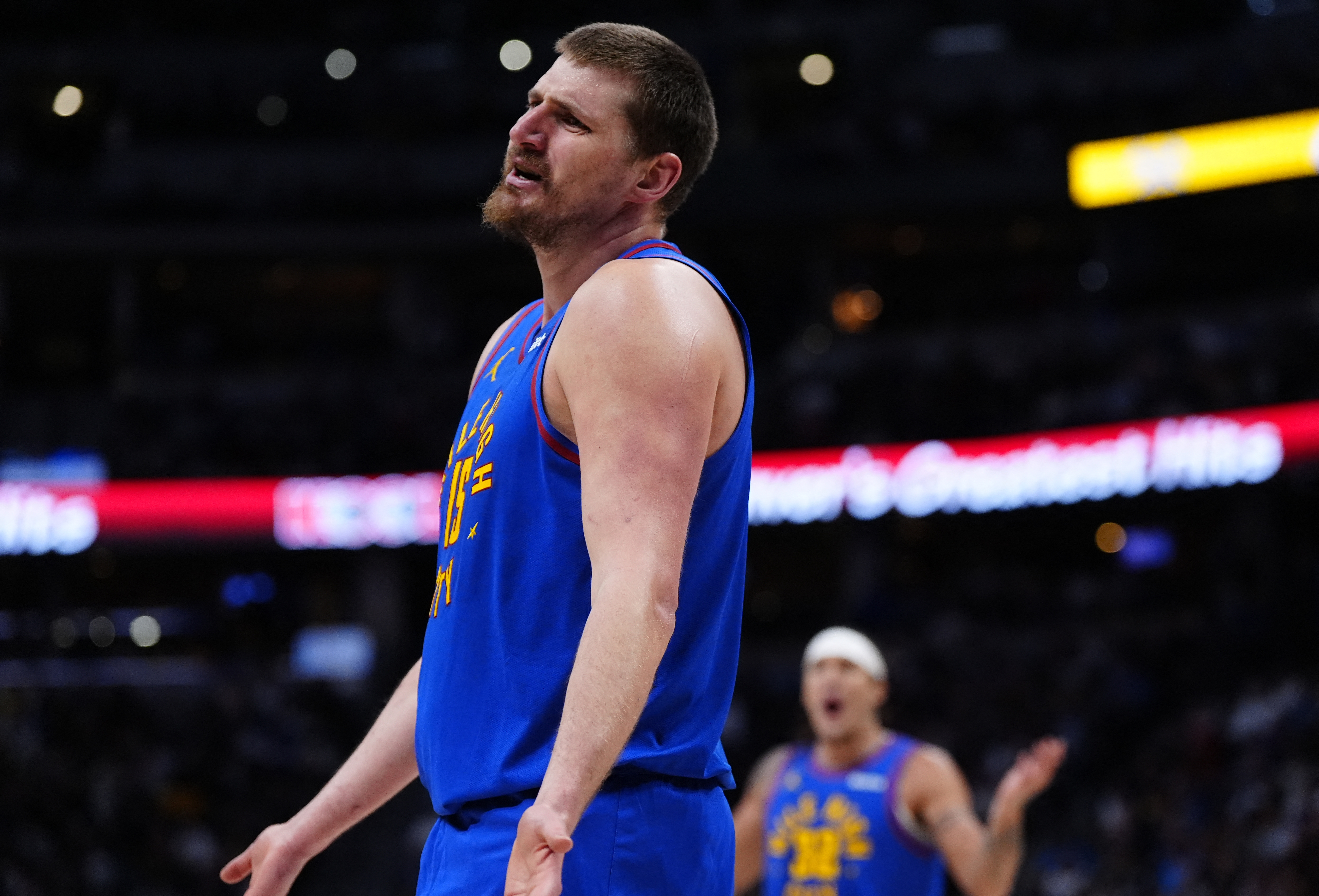 Denver Nuggets center Nikola Jokic (15), seen here reacting to a foul, is featured in our NBA player props today.
