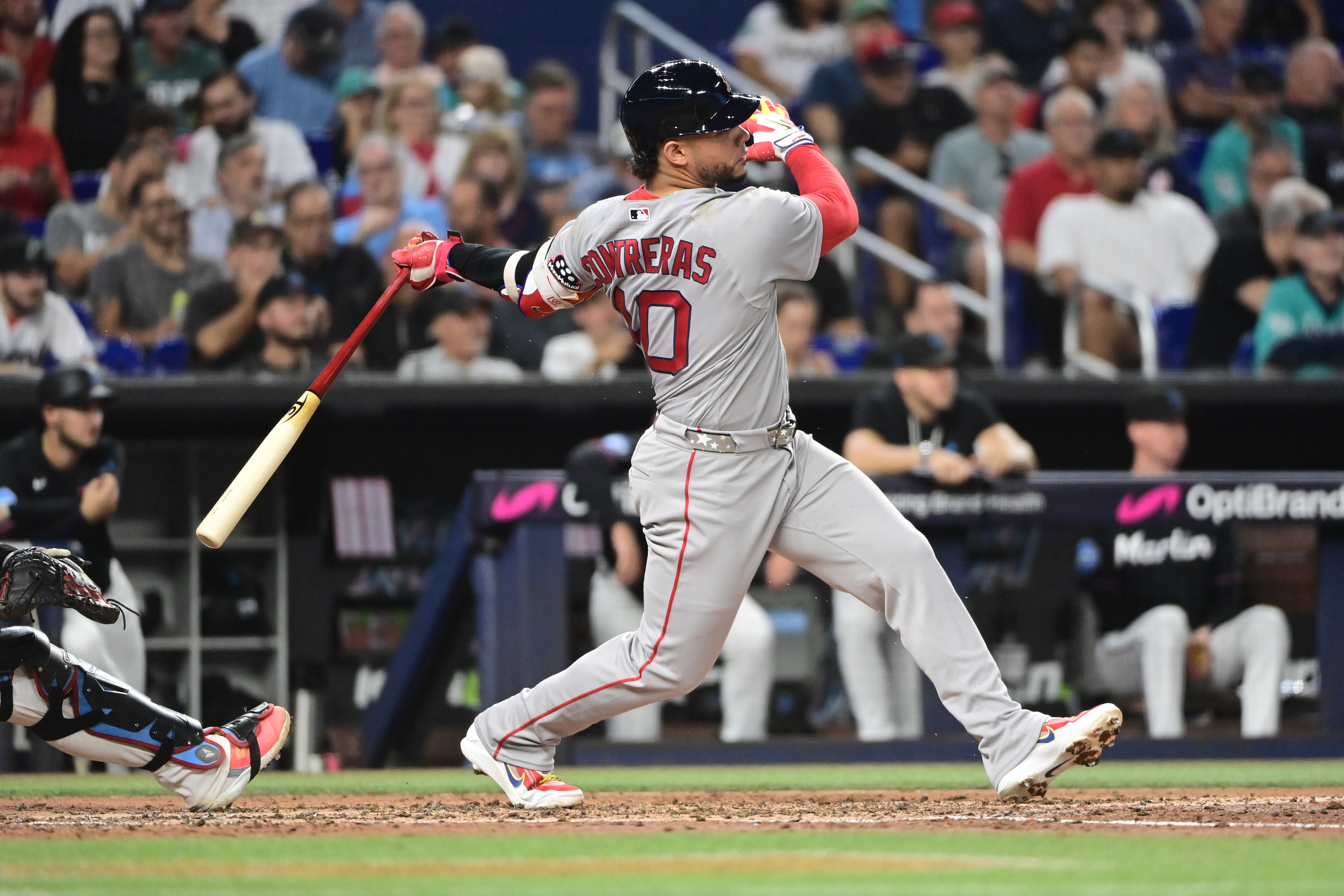 Wilson Contreras #40 of the Boston Red Sox singles as he is featured in our Red Sox vs. Yankees prediction.