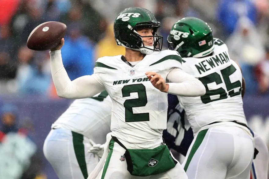Zach Wilson #2 of the New York Jets attempts a pass as we look at our NFL predictions for Week 9