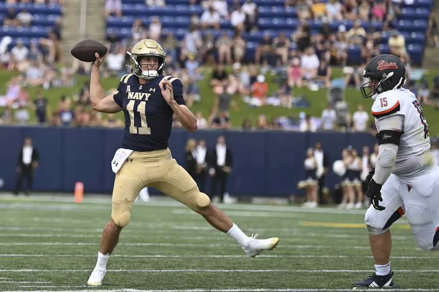 Navy Midshipmen quarterback Blake Horvath throws on the run during the first half as we offer our Navy vs. Army early leans.
