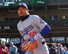 Mookie Betts of the Los Angeles Dodgers takes the field before the game against the Chicago Cubs, and we offer a look at the top MLB MVP odds based on the best MLB odds.