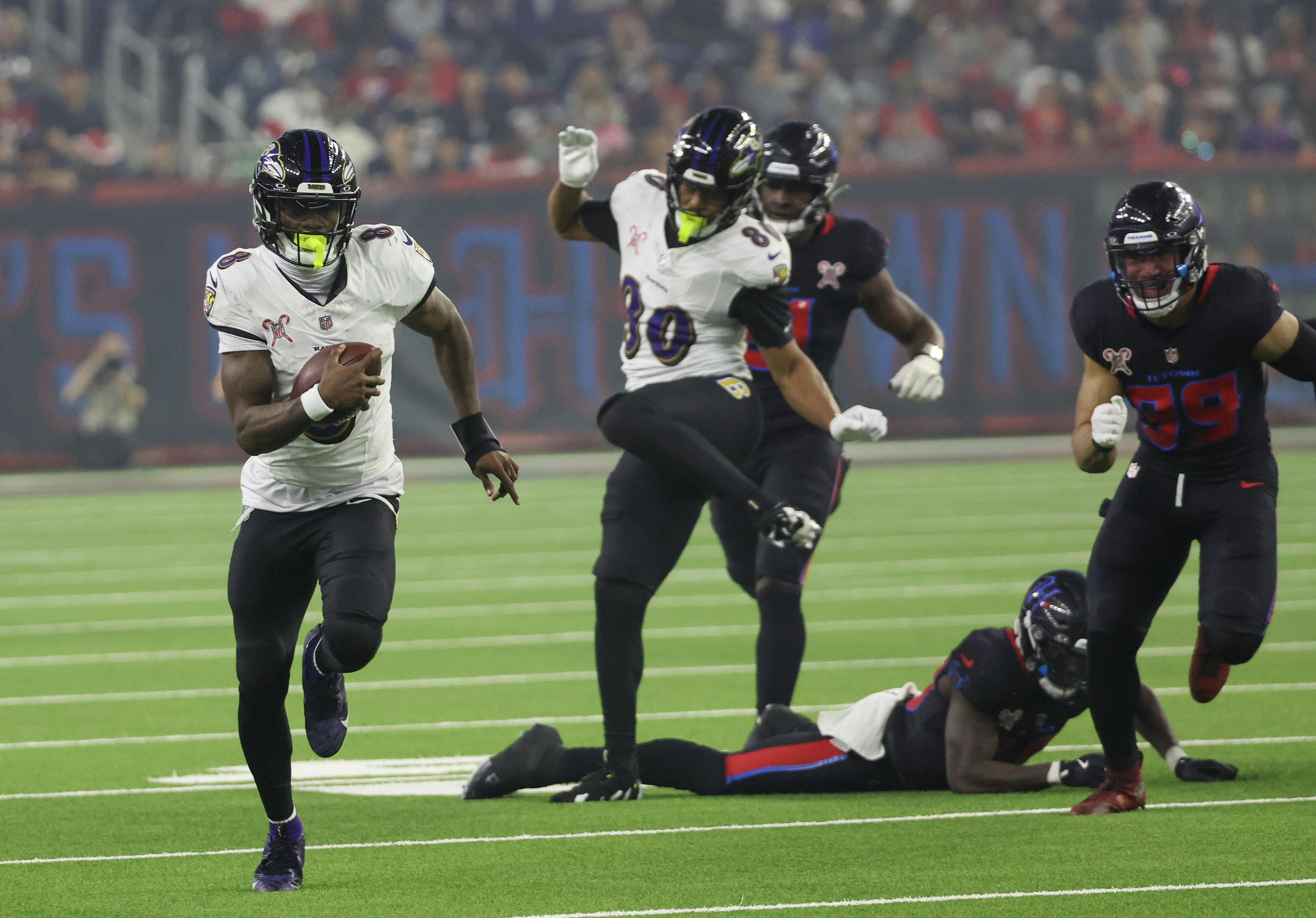 Baltimore Ravens quarterback Lamar Jackson rushes for a 48-yard touchdown against the Houston Texans as we analyze the 2024-25 NFL MVP odds. 