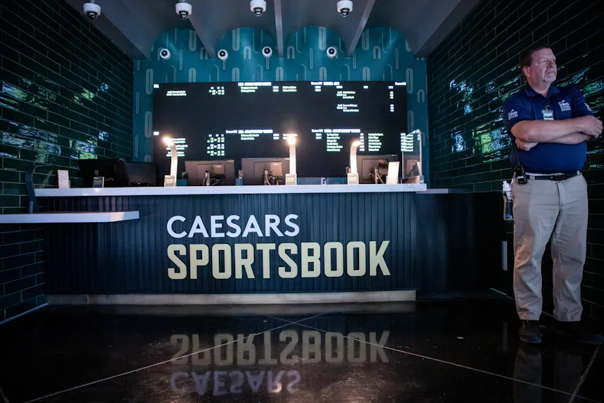 A security guard stands in front of one of the betting windows on the second floor of the Caesars Sportsbook as we look at Caesars Entertainment Q4 results being impacted by F1 attendance.