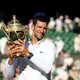 Novak Djokovic celebrates victory by holding the trophy during Day 14 of The Championships Wimbledon 2022 at All England Lawn Tennis and Croquet Club on July 10, 2022 in London, England.