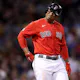 Rafael Devers of the Boston Red Sox looks on during the eighth inning against the Kansas City Royals and we offer our look at the top futures odds and picks for the Red Sox in 2023.