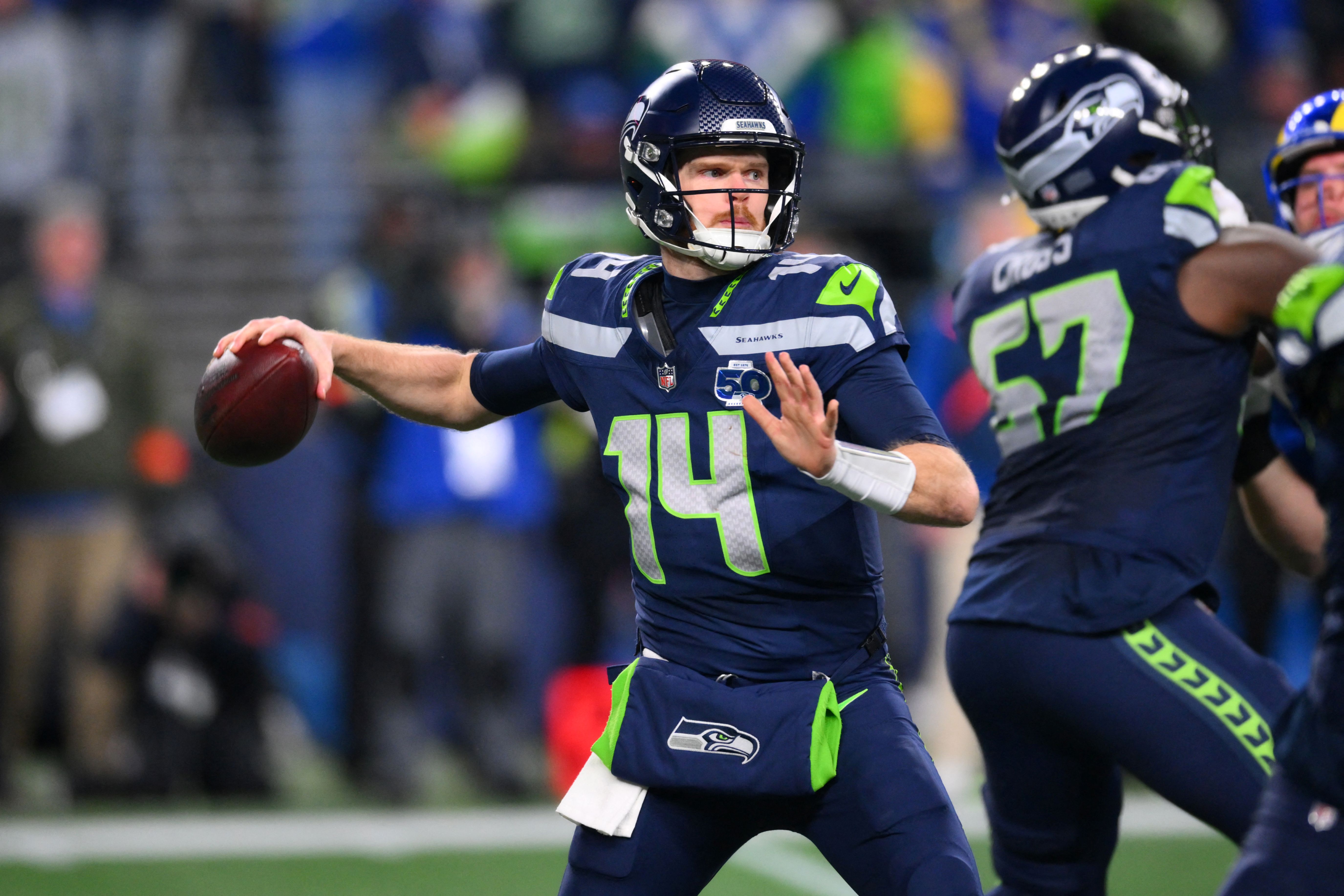 Seattle Seahawks quarterback Sam Darnold (14) passes against the Los Angeles Rams as we break down the Super Bowl MVP odds for Seahawks vs. Patriots.