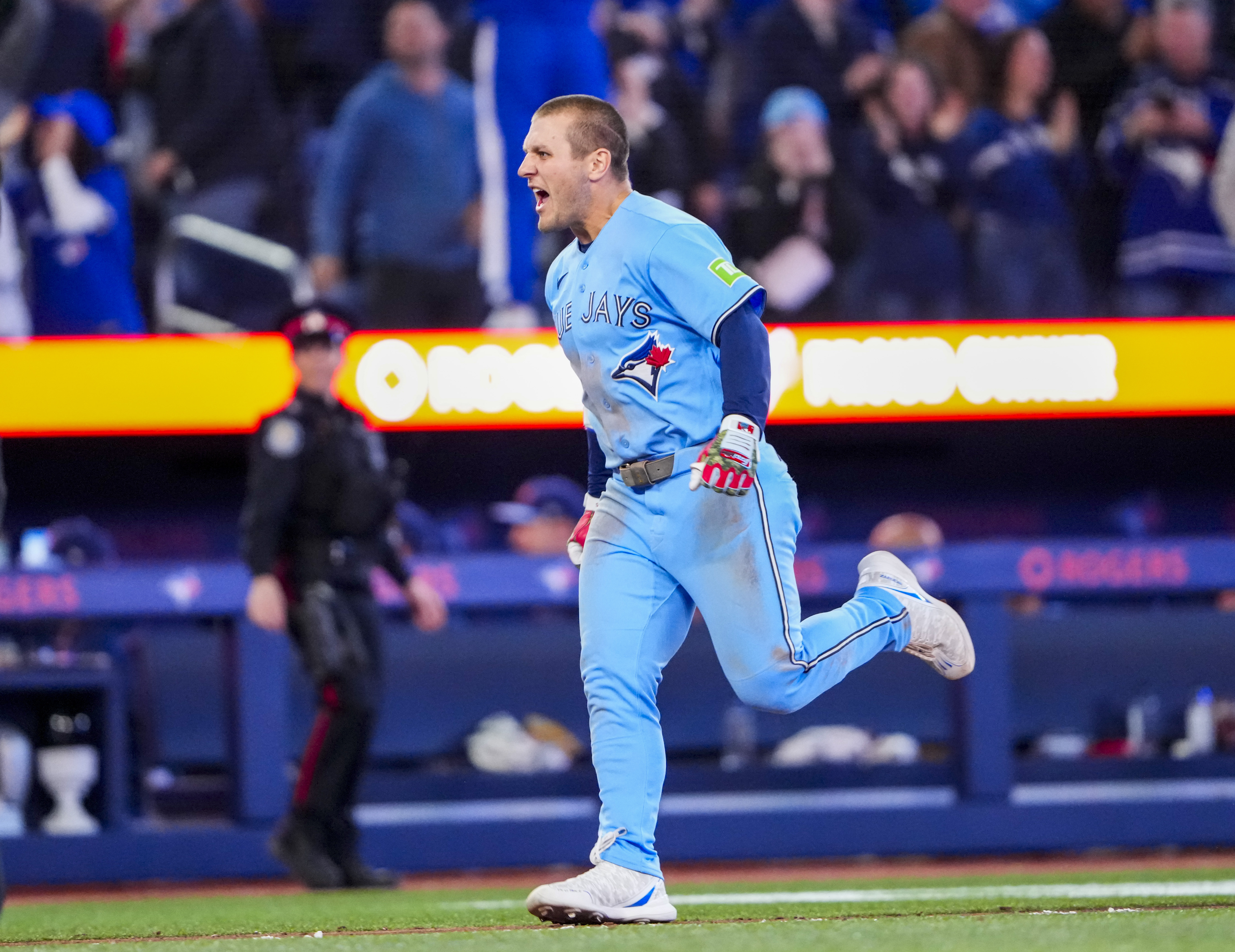 Toronto Blue Jays center fielder Daulton Varsho - who's featured in my Blue Jays vs. Tigers prediction - celebrates hitting a grand slam. 