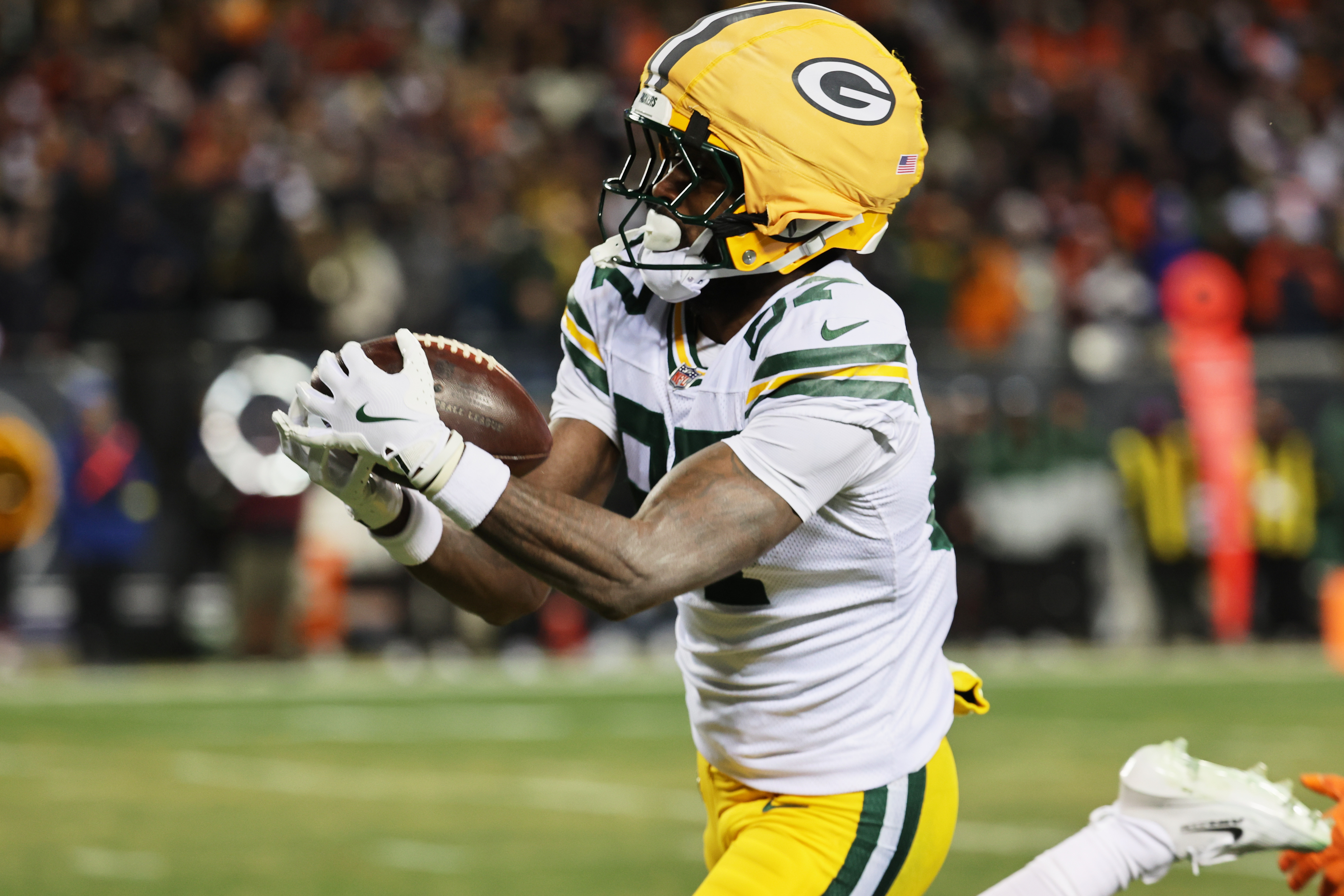 Green Bay Packers wide receiver Romeo Doubs (87) catches a thirty-three yard touchdown as he is featured in our Ravens vs. Packers anytime touchdown scorer predictions.