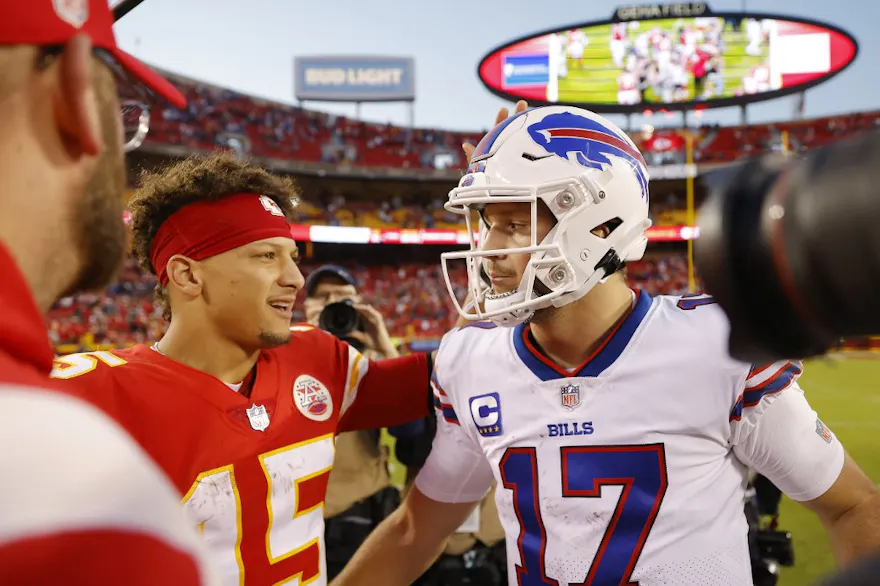 Patrick Mahomes #15 of the Kansas City Chiefs shakes hands with Josh Allen as we make our NFL Divisional Round predictions
