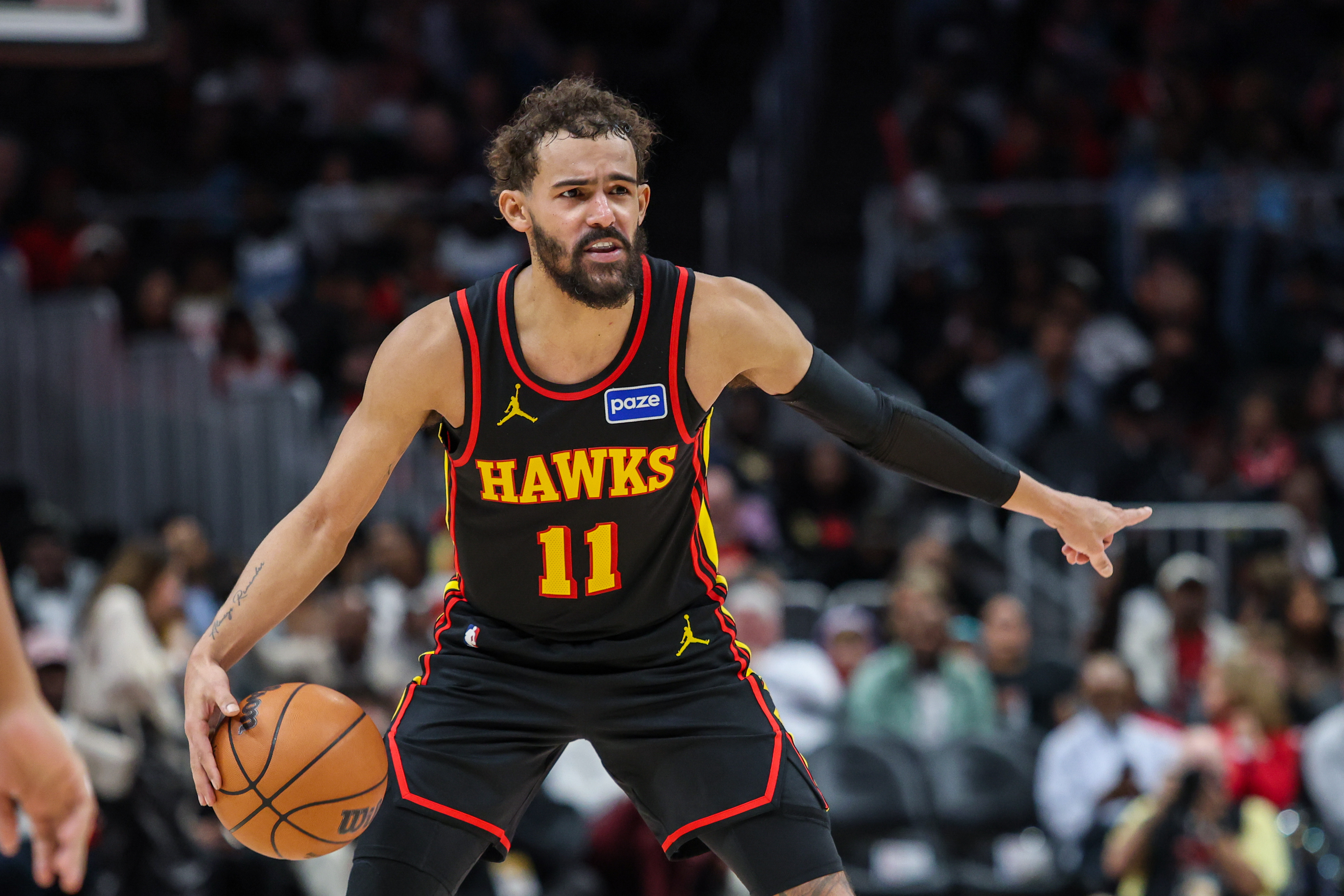 Atlanta Hawks guard Trae Young (11) points to teammates as he is featured in our Knicks vs. Hawks player props.