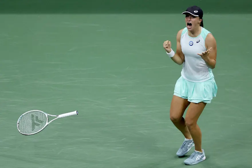 Iga Swiatek of Poland celebrates after defeating Aryna Sabalenka during their Women's Singles Semifinal match on Day Eleven of the 2022 US Open at USTA Billie Jean King National Tennis Center.