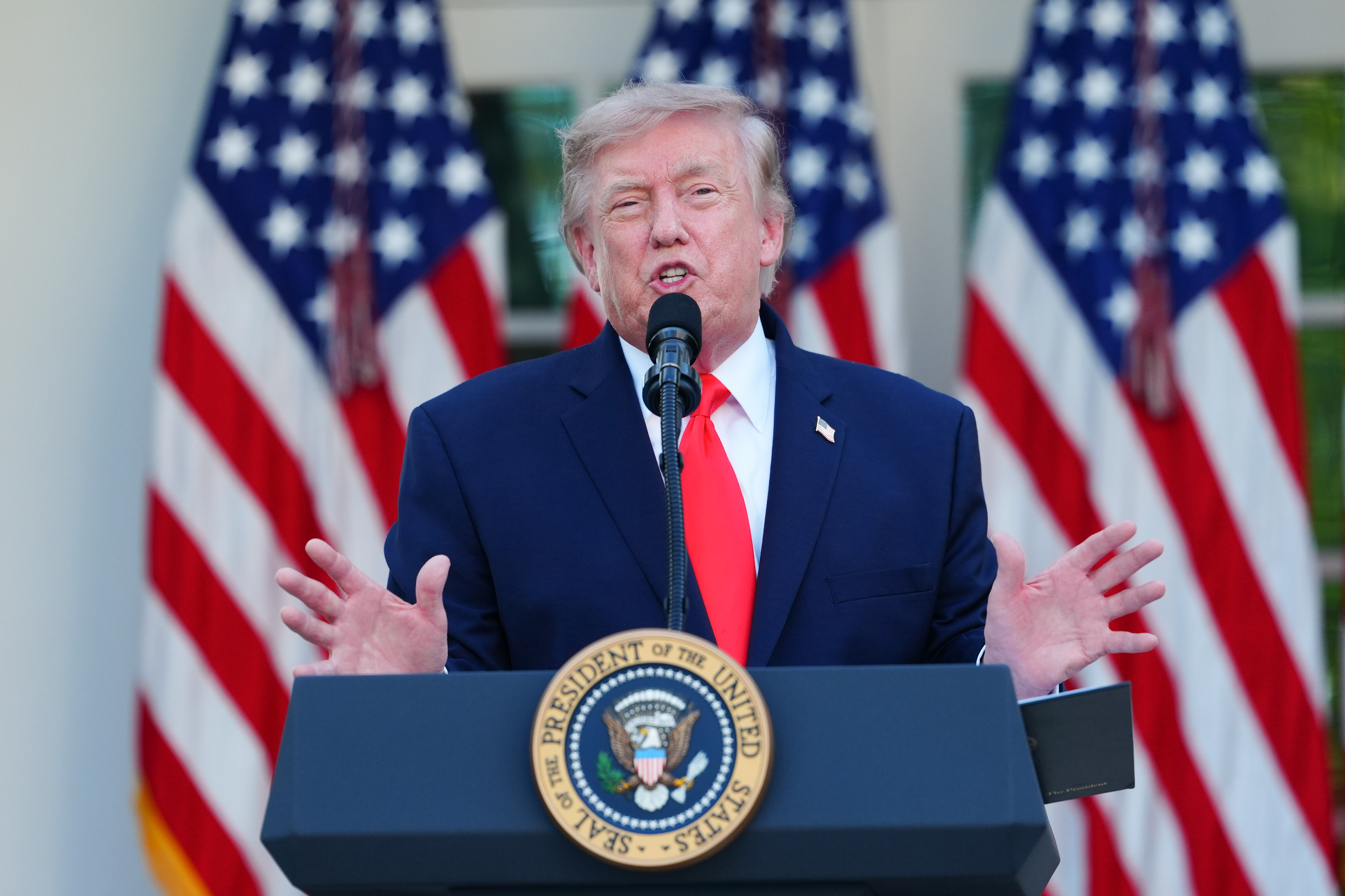 US President Donald Trump speaks during a dinner, as we look at his impeachment odds on Polymarket