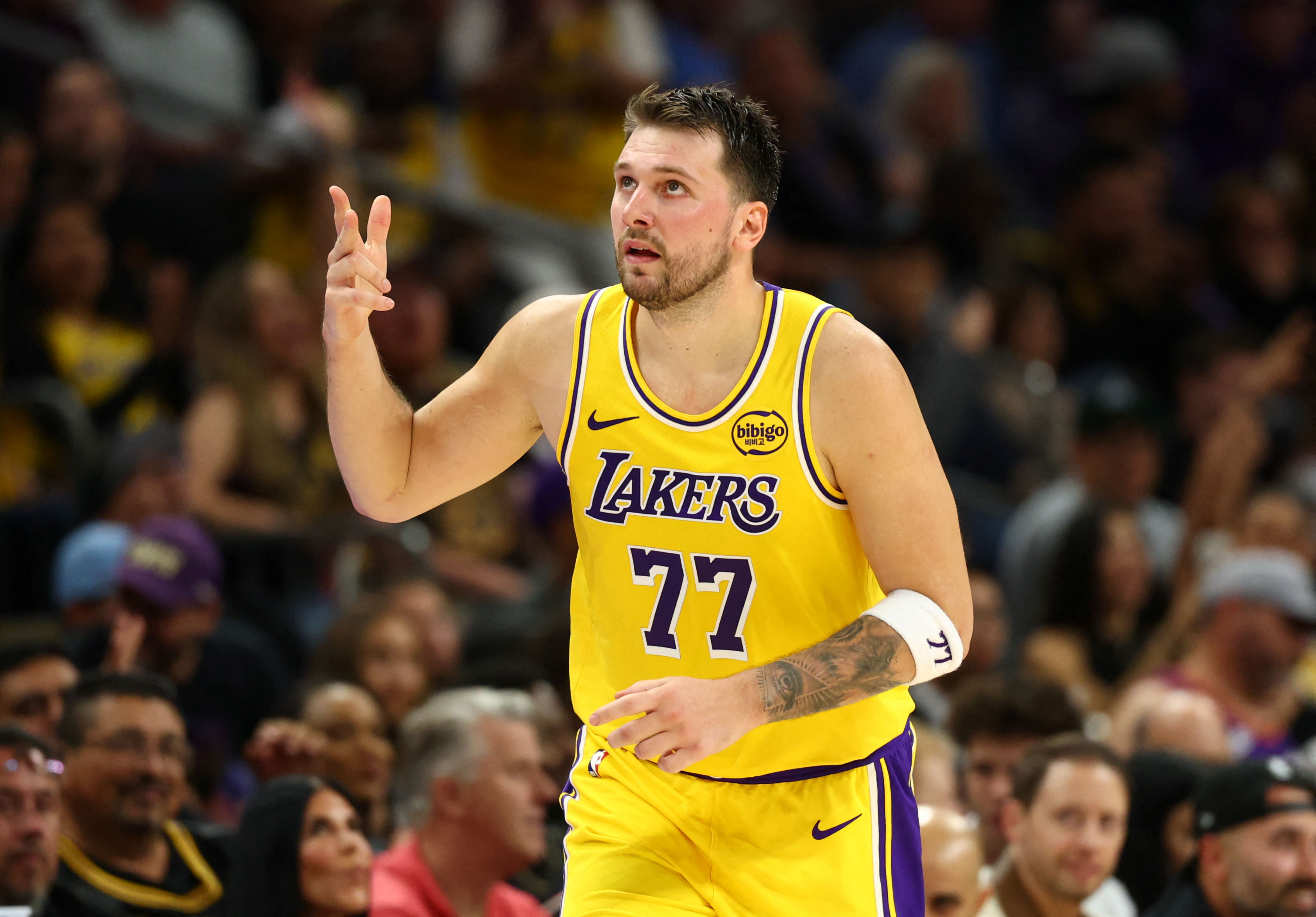 Los Angeles Lakers guard Luka Doncic celebrates, and he's a focus of our NBA player props today.