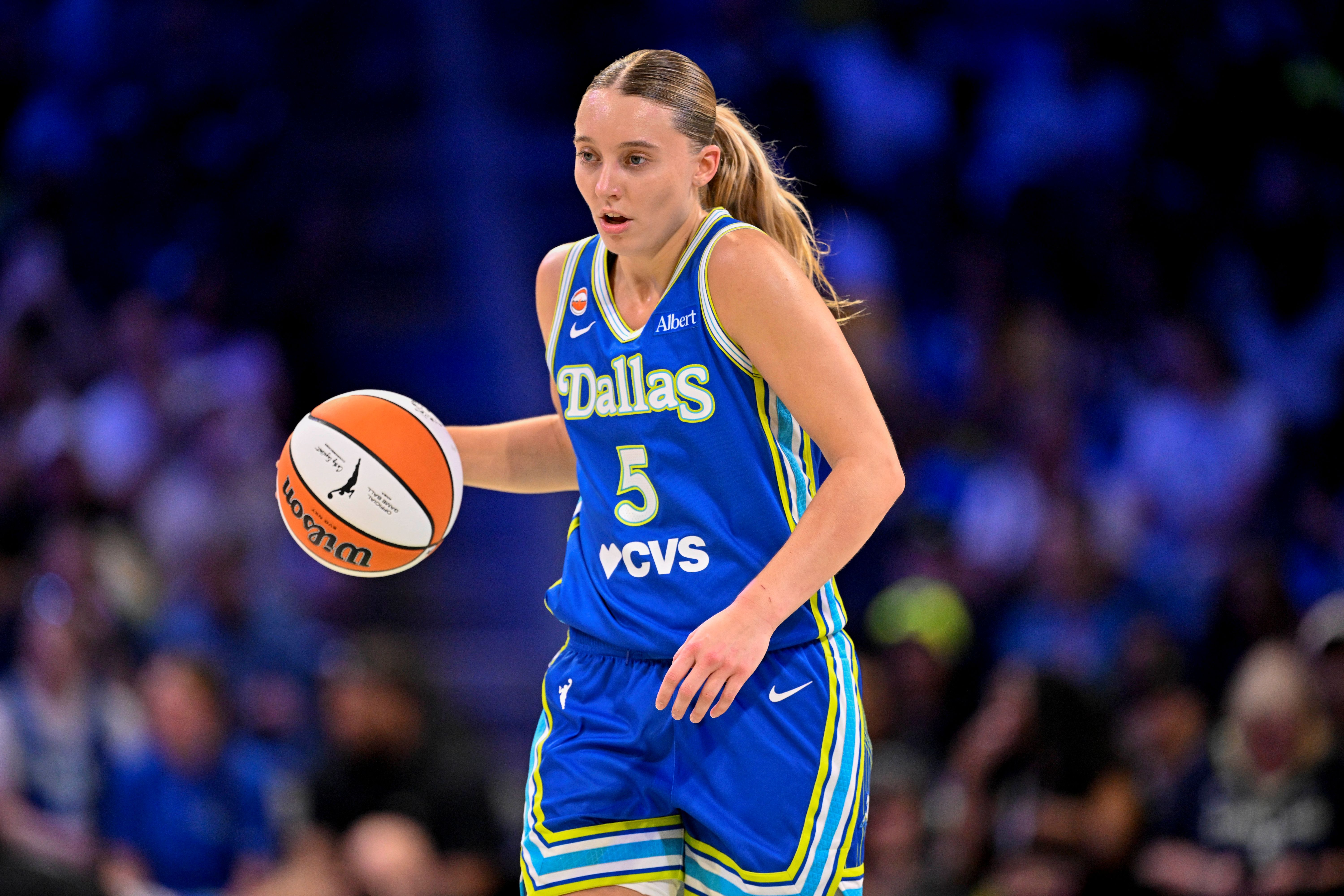 Dallas Wings guard Paige Bueckers brings the ball up court as we make our best Mystics vs. Wings prediction.