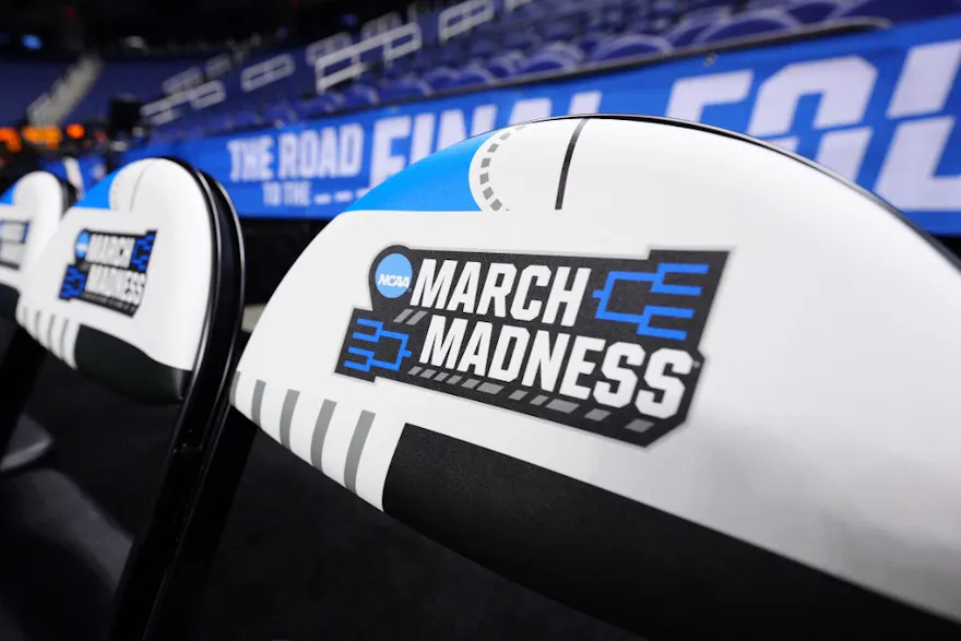 The March Madness logo is seen on seats prior to the second round of the NCAA Men's Basketball Tournament. 