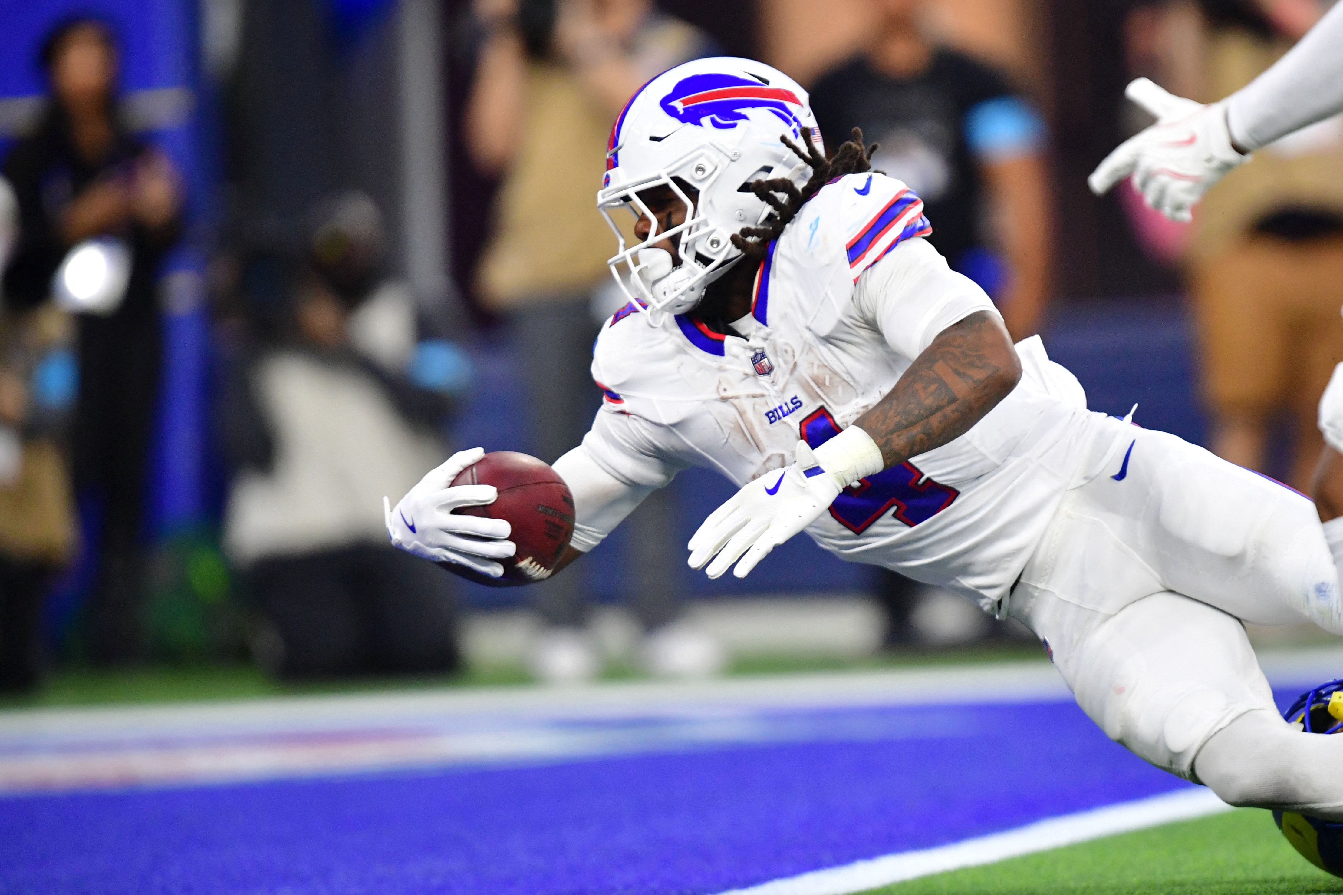 Buffalo Bills running back James Cook III (4) rushes for a touchdown as we offer our Bills vs. Raiders player props.