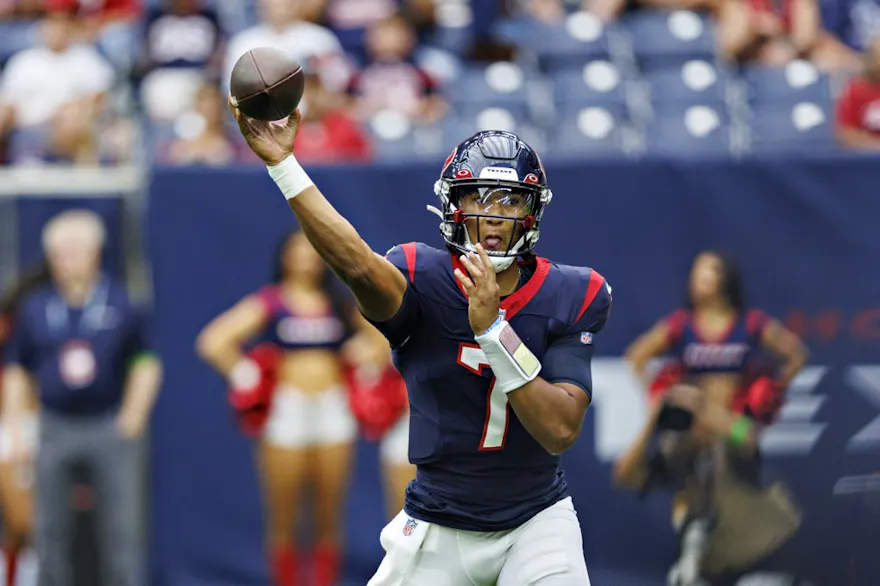 C.J. Stroud of the Houston Texans throws a pass as we analyze the NFL most passing yards odds.