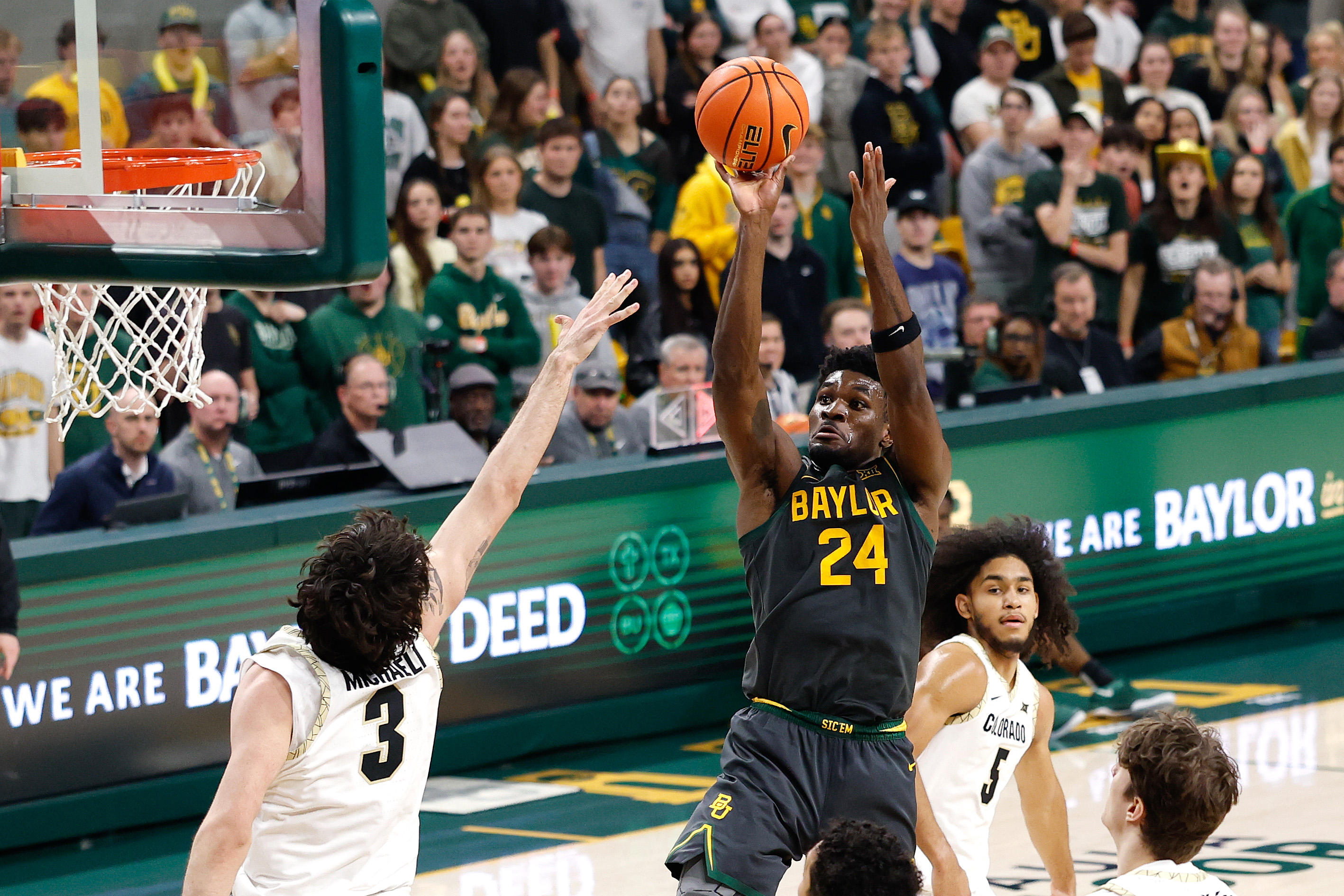 Baylor's Tounde Yessoufou (24) takes on Colorado in one of four quarterfinal games covered in our College Basketball Crown predictions.