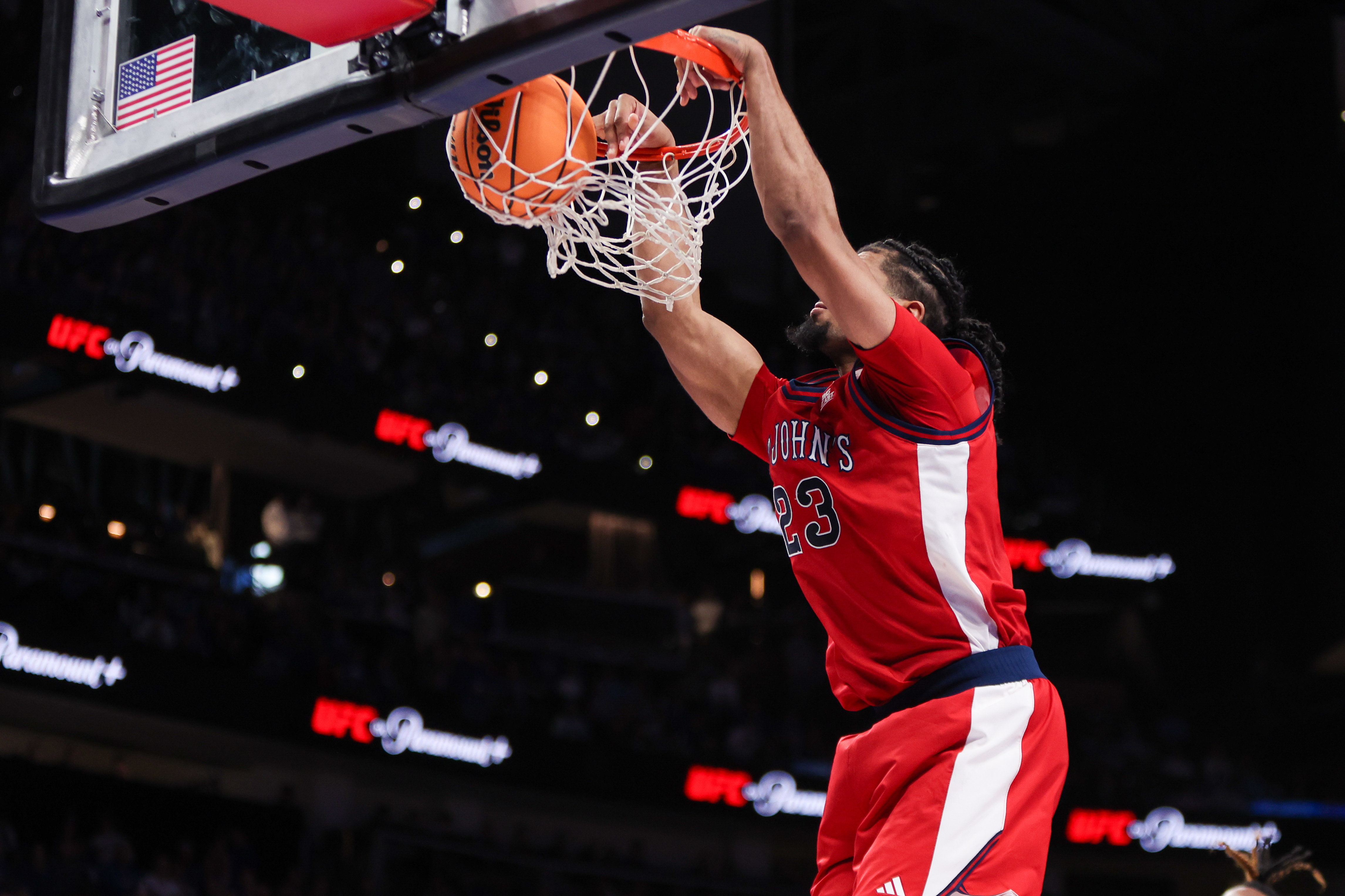 St. John’s forward Bryce Hopkins (23) dunks as we offer our Harvard vs. St. John’s predictions.