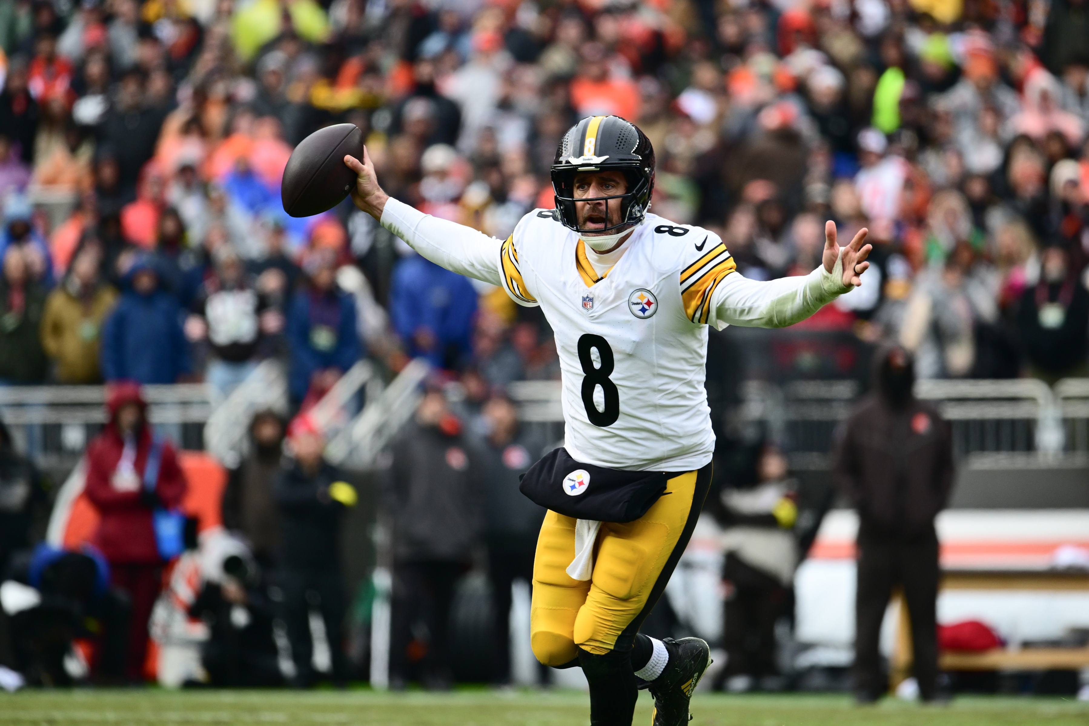 Pittsburgh Steelers quarterback Aaron Rodgers (8) reacts as we break down our NFL weather report Week 18.