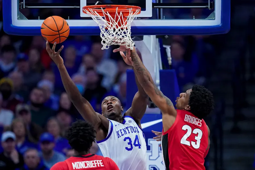 Oscar Tshiebwe of the Kentucky Wildcats attempts a layup while Braelen Bridges of the Georgia Bulldogs guards at Rupp Arena on Jan. 17, 2023 in Lexington, Kentucky.
