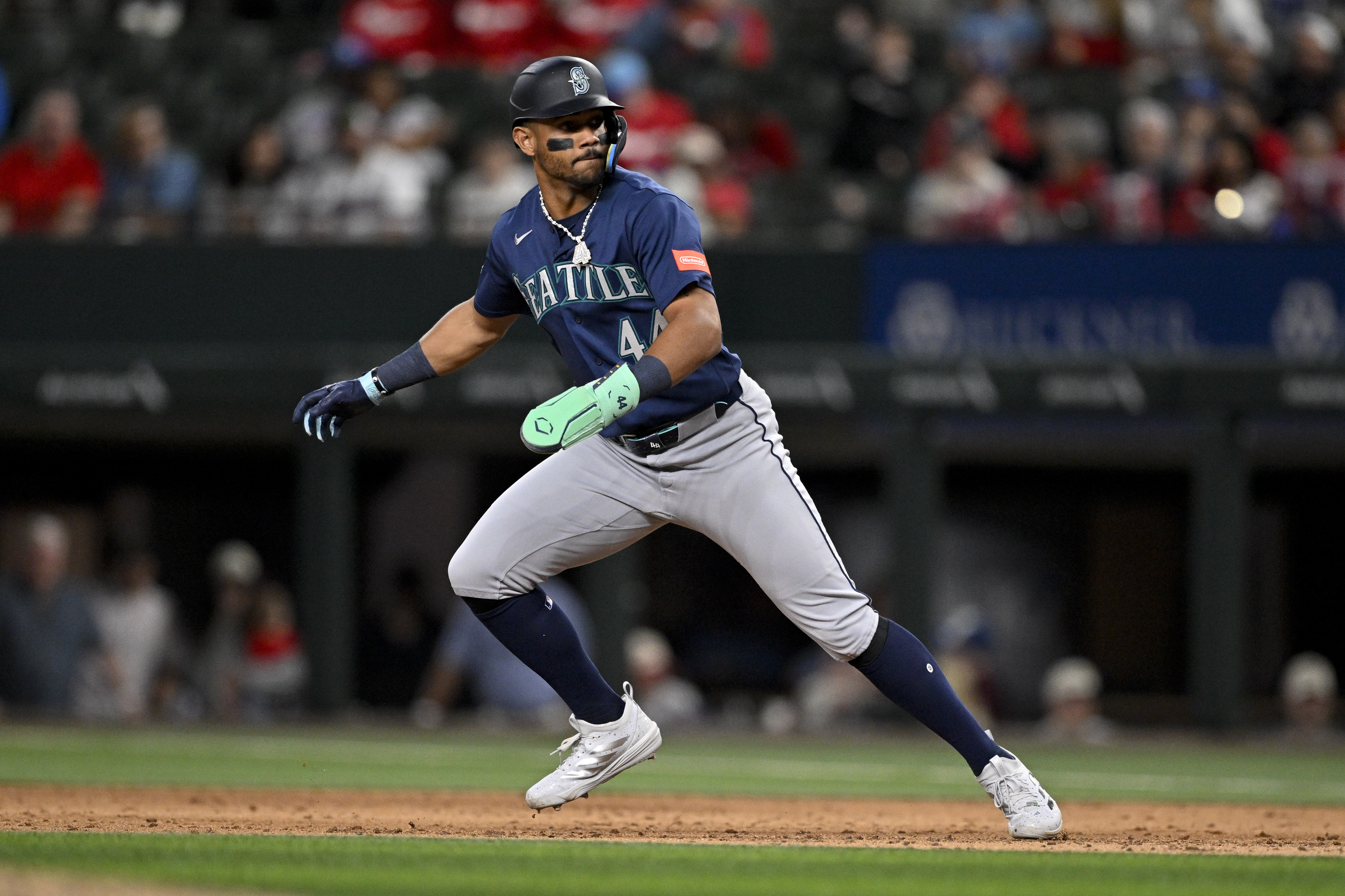 Seattle Mariners center fielder Julio Rodriguez (44) leads off from first base as he is featured in our Rangers vs. Mariners prediction & picks.