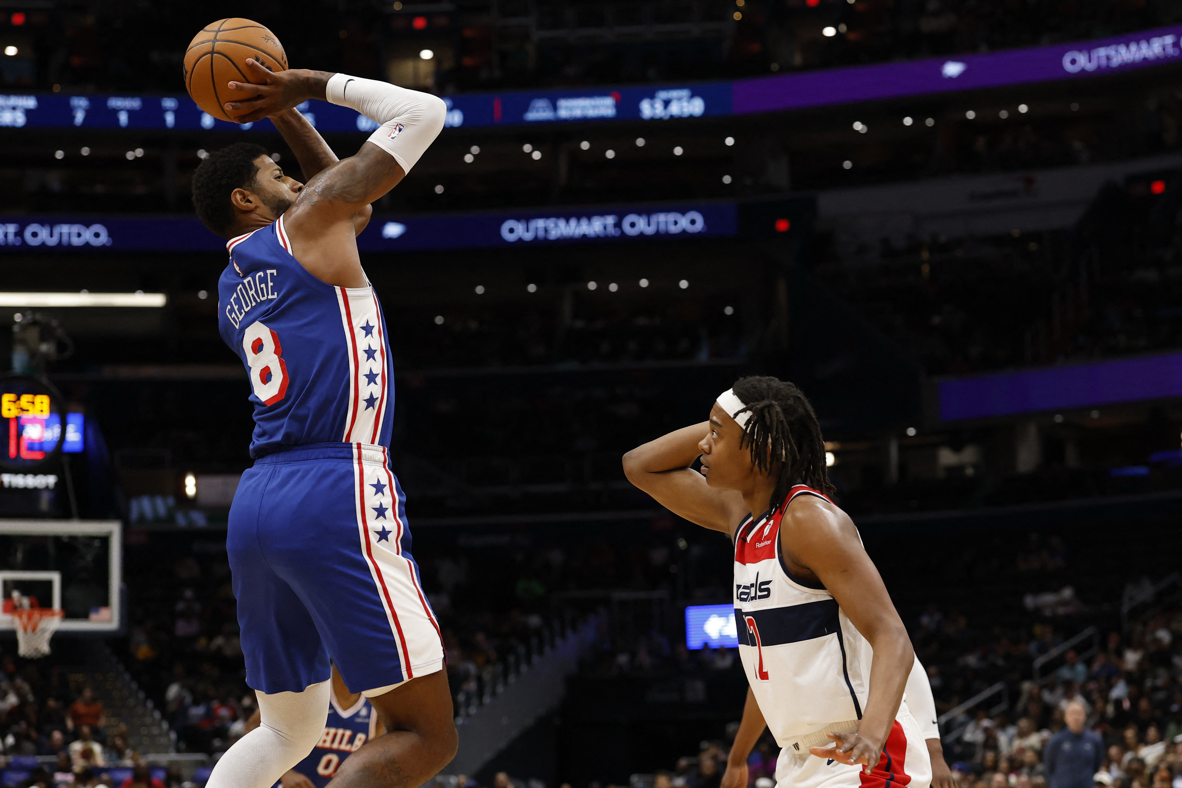 Philadelphia 76ers forward Paul George (8) shoots the ball as we break down our NBA Play of the Day.
