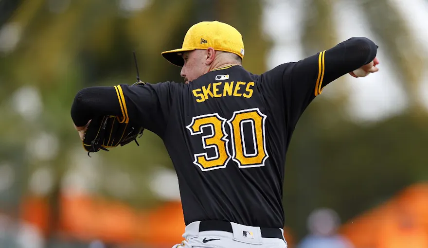 Paul Skenes (30) of the Pittsburgh Pirates pitches during a spring training game, as we offer our best Paul Skenes player props and expert picks for Pirates vs. Cubs on Saturday in Skenes' MLB debut.
