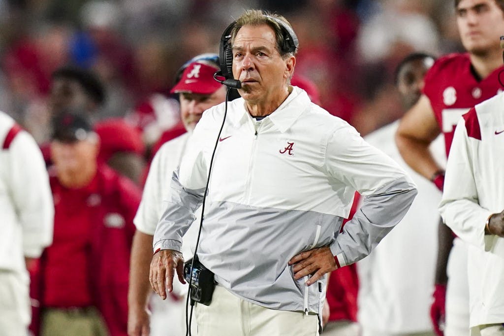 Nick Saban stands on the Alabama sidelines at Bryant-Denny Stadium.