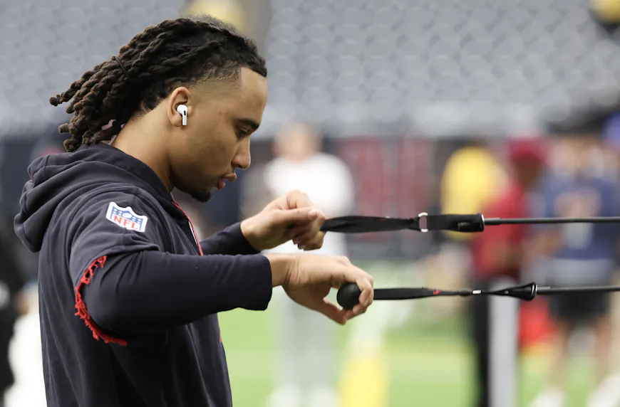 Houston Texans quarterback C.J. Stroud warms up as we make our best C.J. Stroud TNF player prop bets.