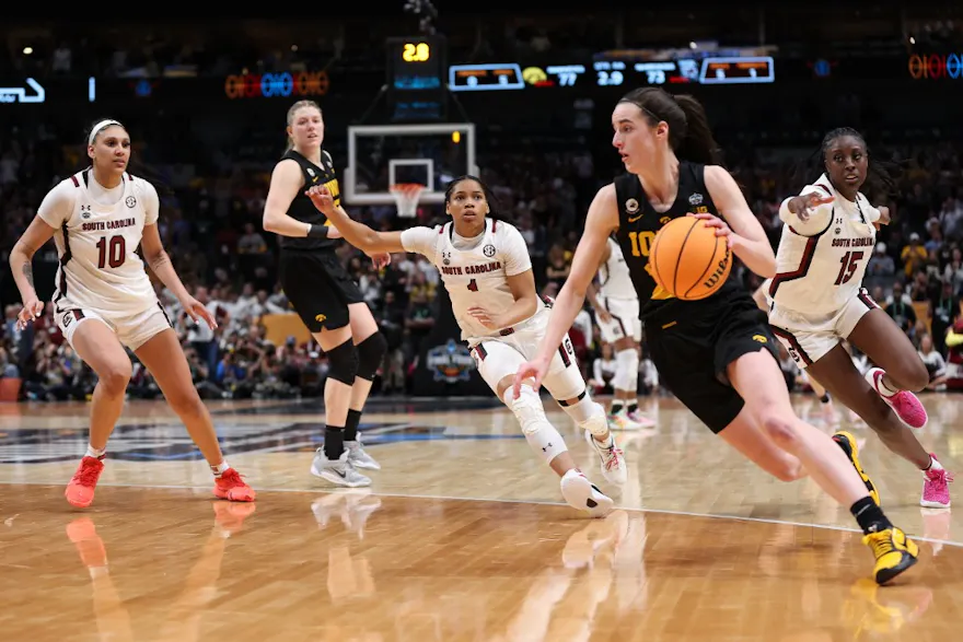 Caitlin Clark of the Iowa Hawkeyes dribbles the ball as we look at our LSU vs. Iowa predictions