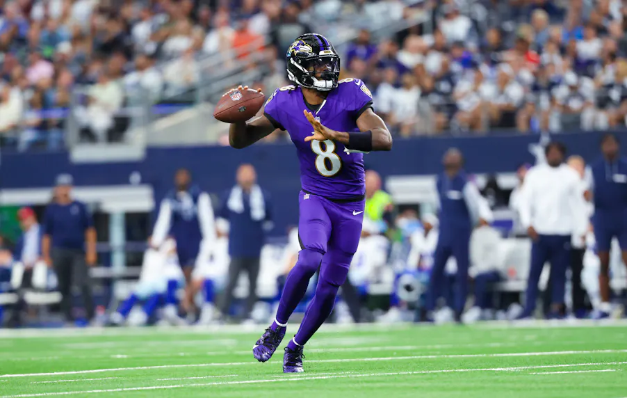 Baltimore Ravens quarterback Lamar Jackson (8) throws as we offer our best Lamar Jackson player props for Bills vs. Ravens on Sunday Night Football.