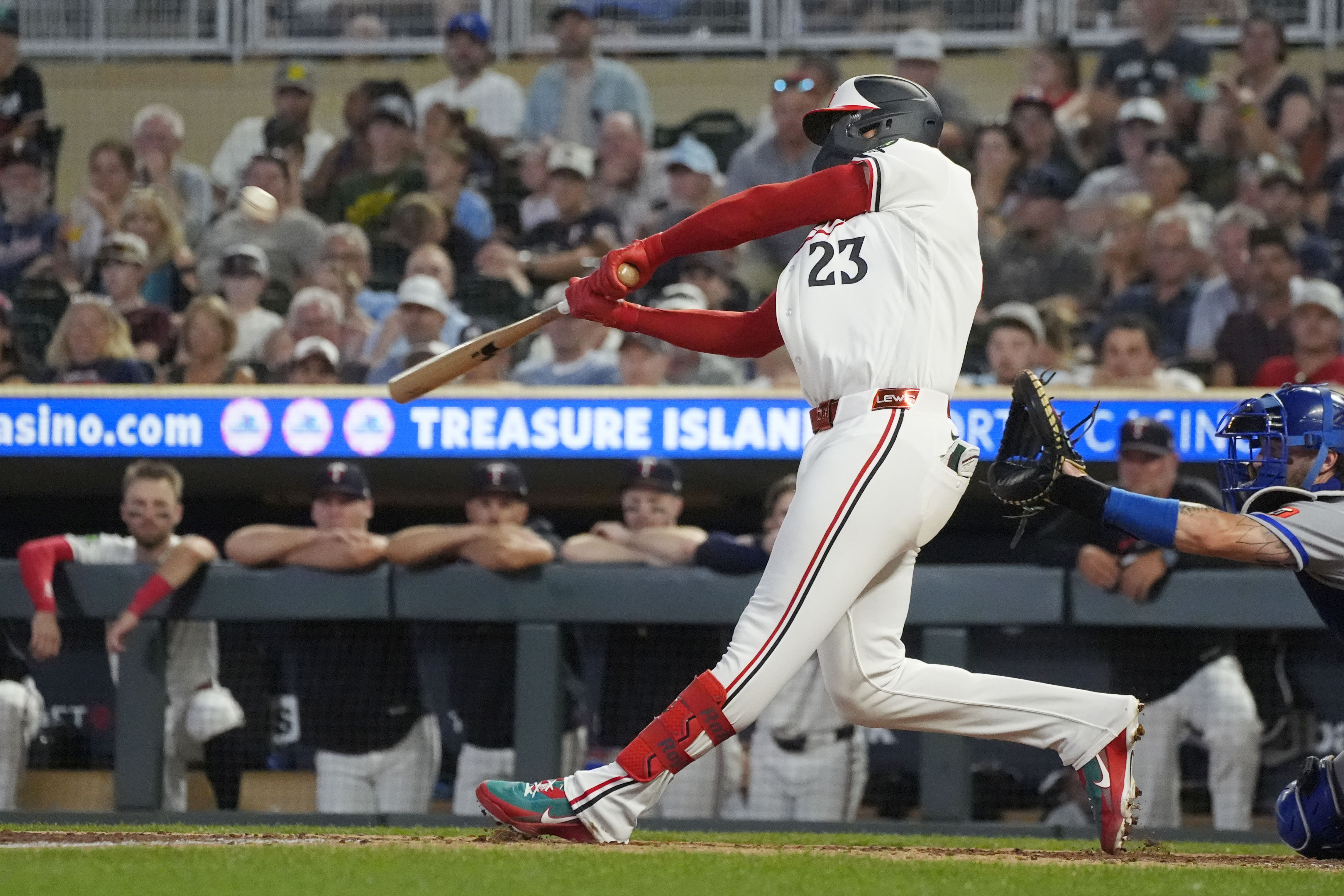 Minnesota Twins first baseman Royce Lewis (23) hits a two-run triple as he is featured in our Twins vs. Mariners picks & predictions.