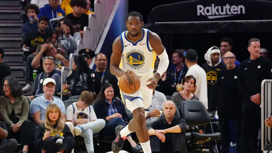 Golden State Warriors forward Jonathan Kuminga (1) dribbles up the court as we break down our best NBA player prop bets tonight.