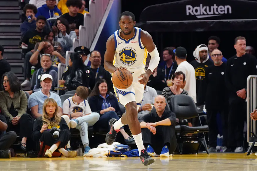 Golden State Warriors forward Jonathan Kuminga (1) dribbles up the court as we break down our best NBA player prop bets tonight.