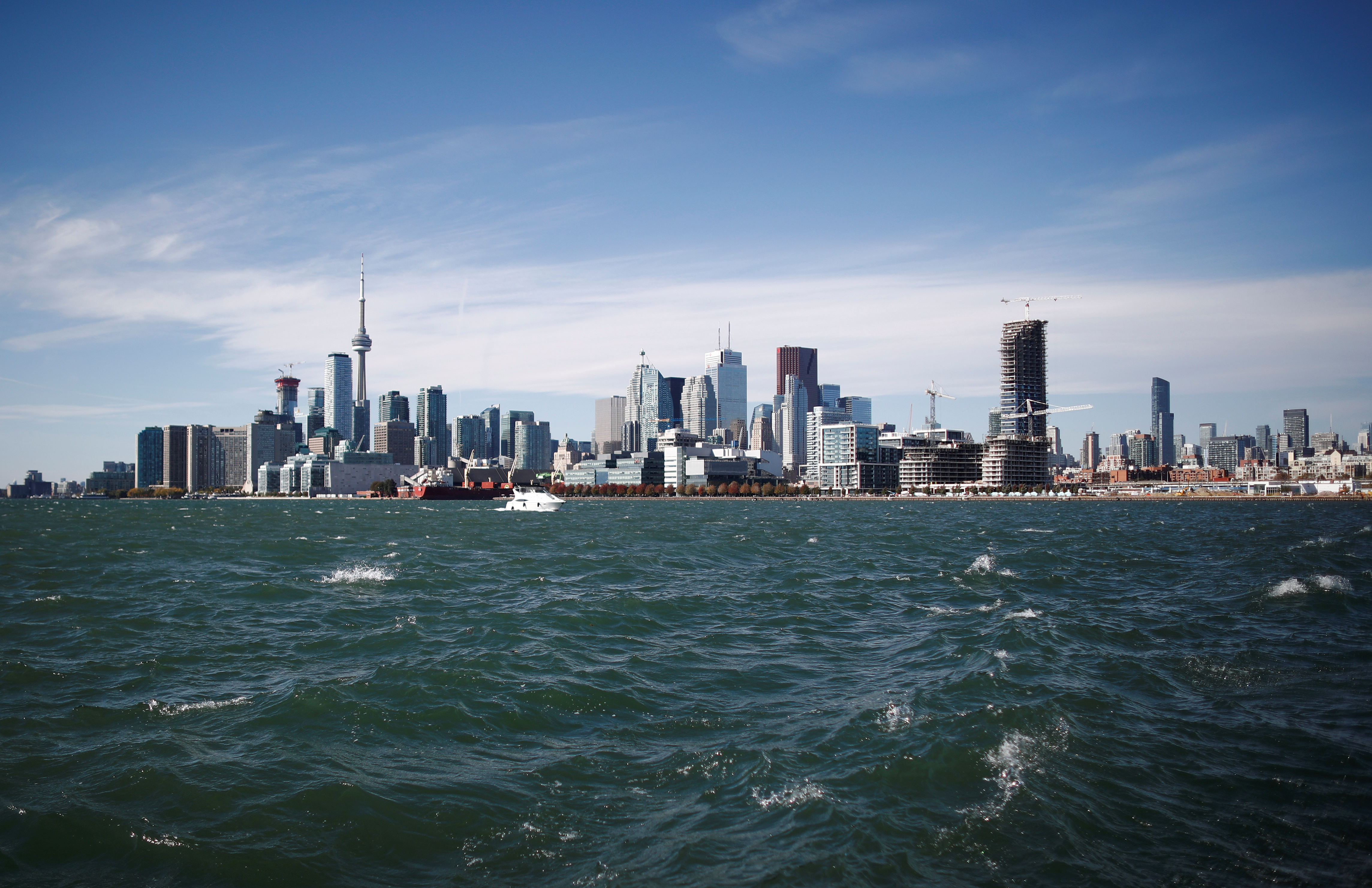 Toronto skyline stands on the waterfront as we break down our our 10 cities we'd like to see host the Super Bowl.