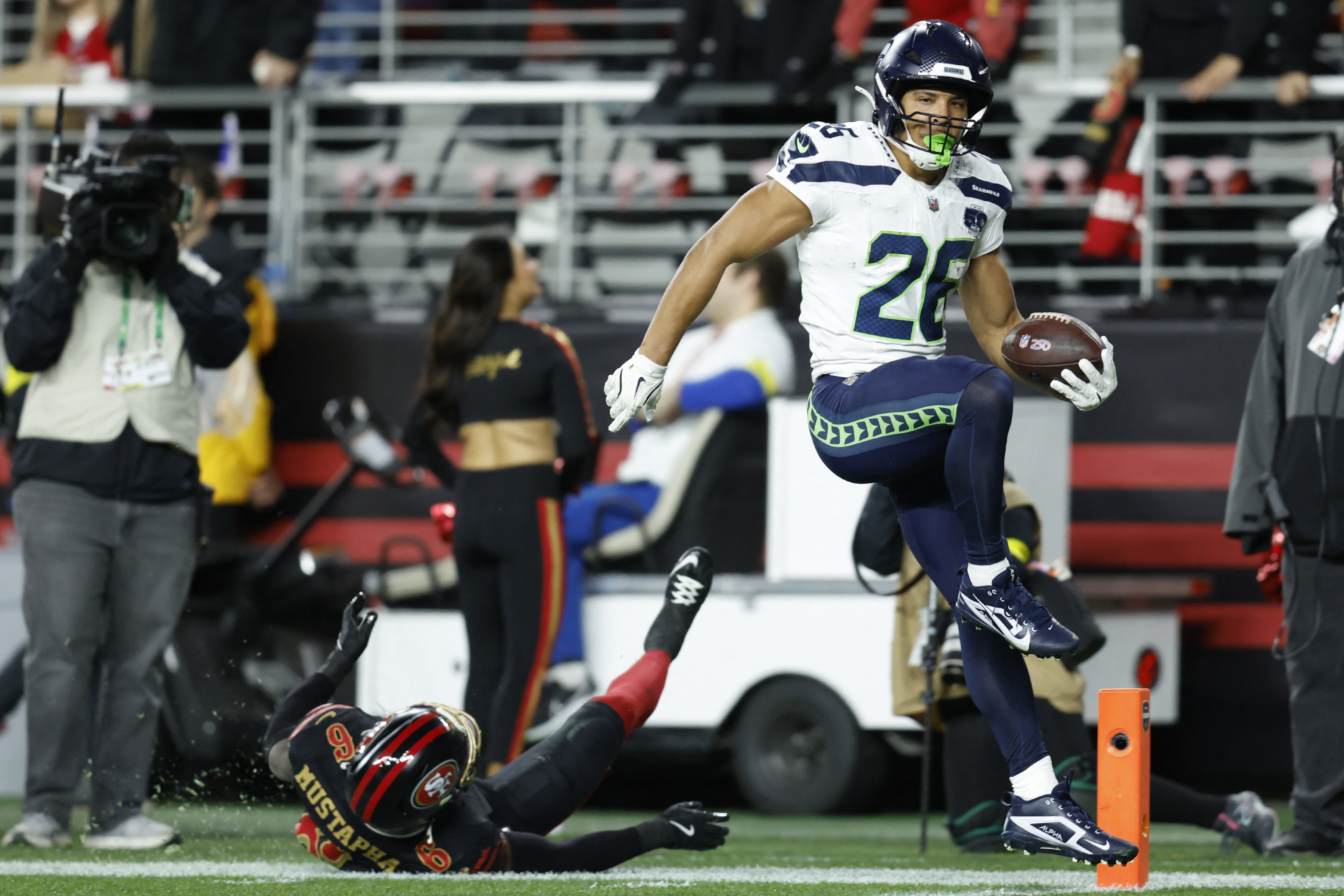 Seattle Seahawks running back Zach Charbonnet rushes for a touchdown as we look at the NFL Divisional Round odds.