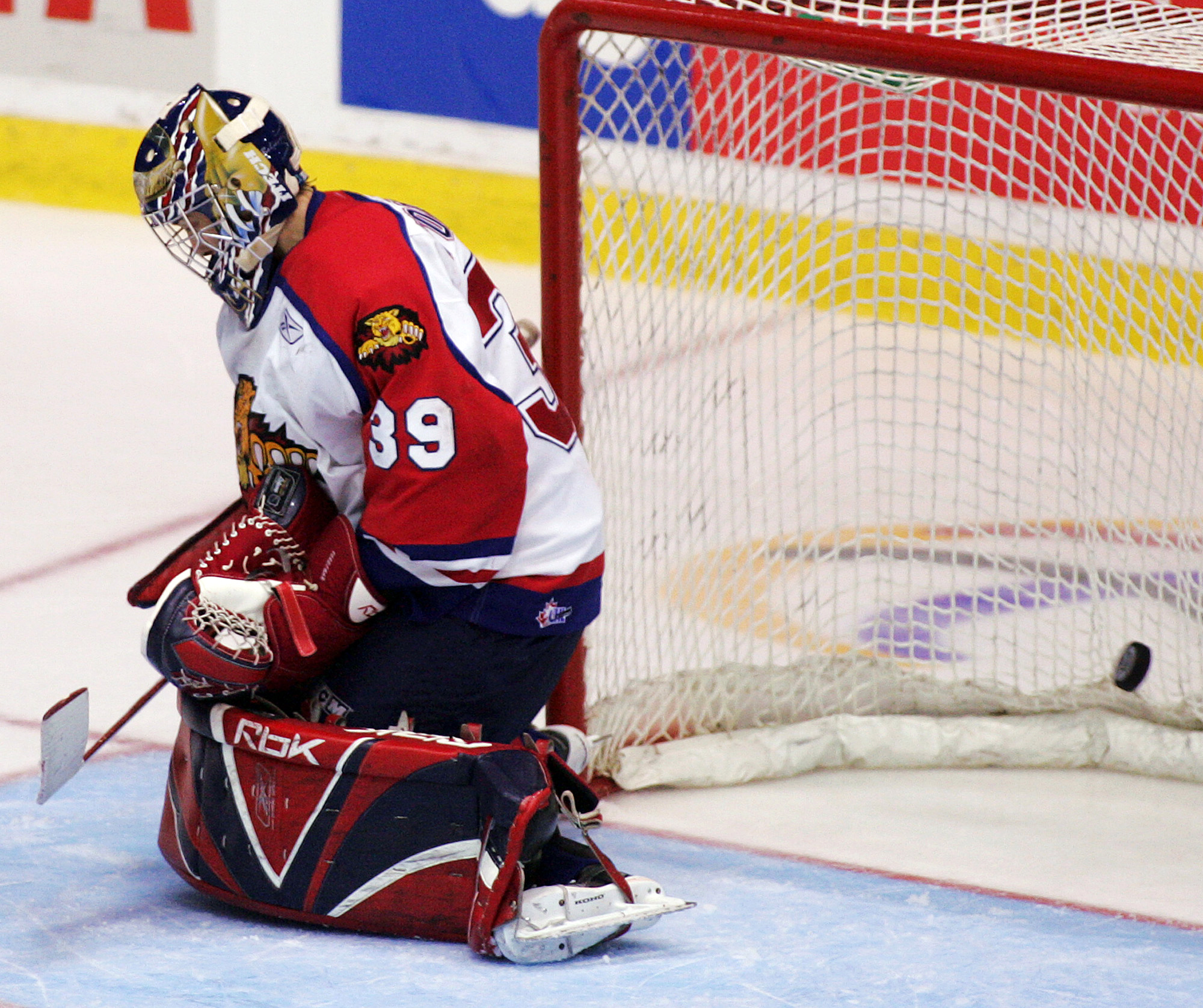 A puck goes past a Moncton Wildcats goaltender as we look at the province of New Brunswick considering opening up to private iGaming operators