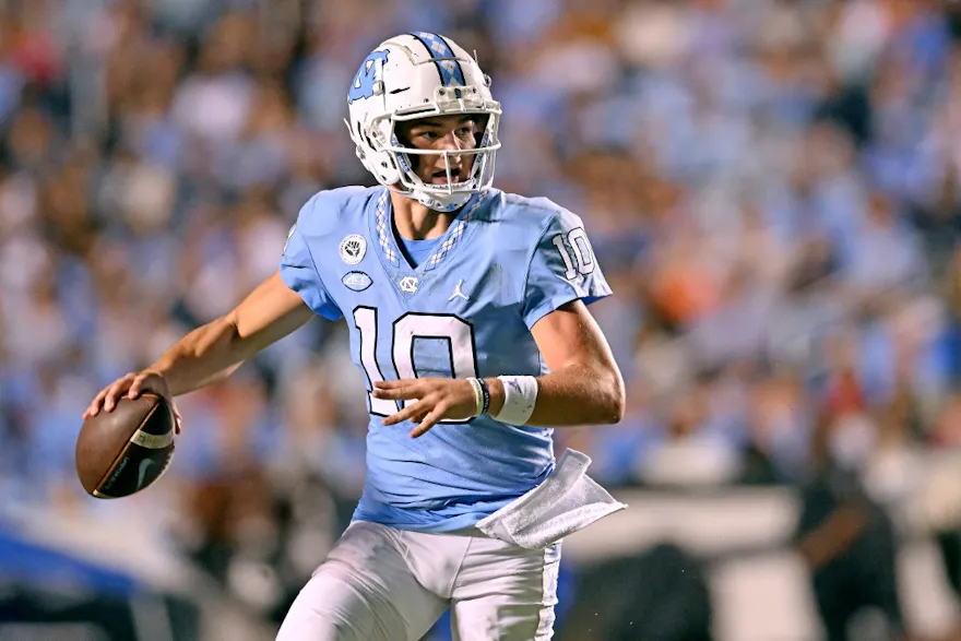 Drake Maye of the North Carolina Tar Heels rolls out against the Florida A&M Rattlers during the first half of their game at Kenan Memorial Stadium.