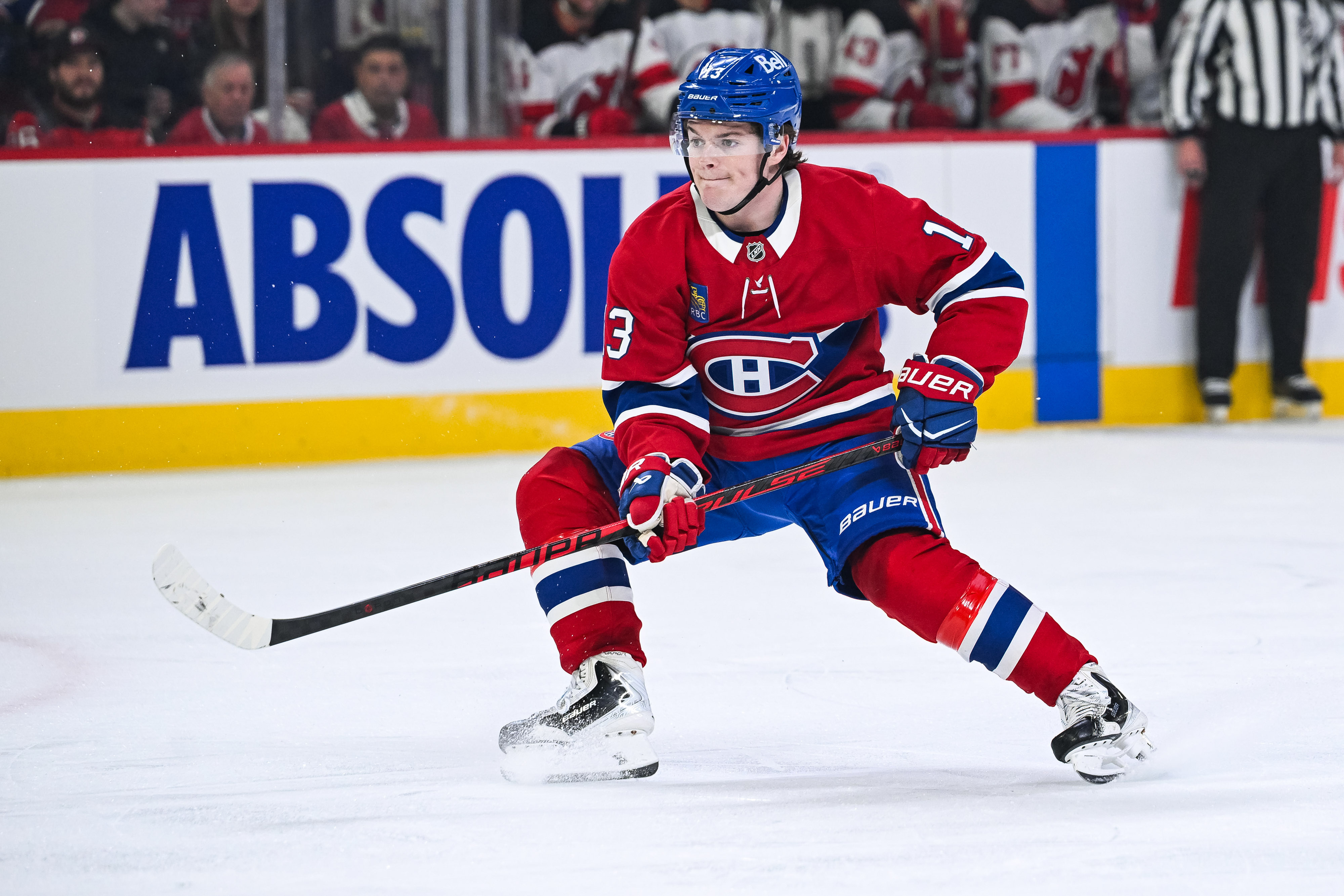 Montreal Canadiens forward Cole Caufield (13) skates as we offer our NHL anytime goal scorer predictions today.
