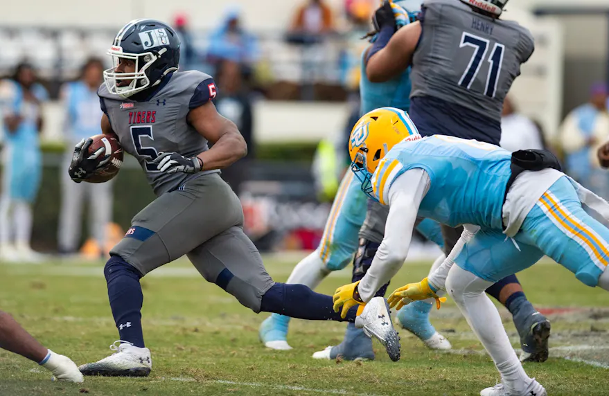 Jackson State running back Irv Mulligan runs the ball during the SWAC Championship game against Southern. We're backing the Tigers in our Jackson State vs. South Carolina State prediction.
