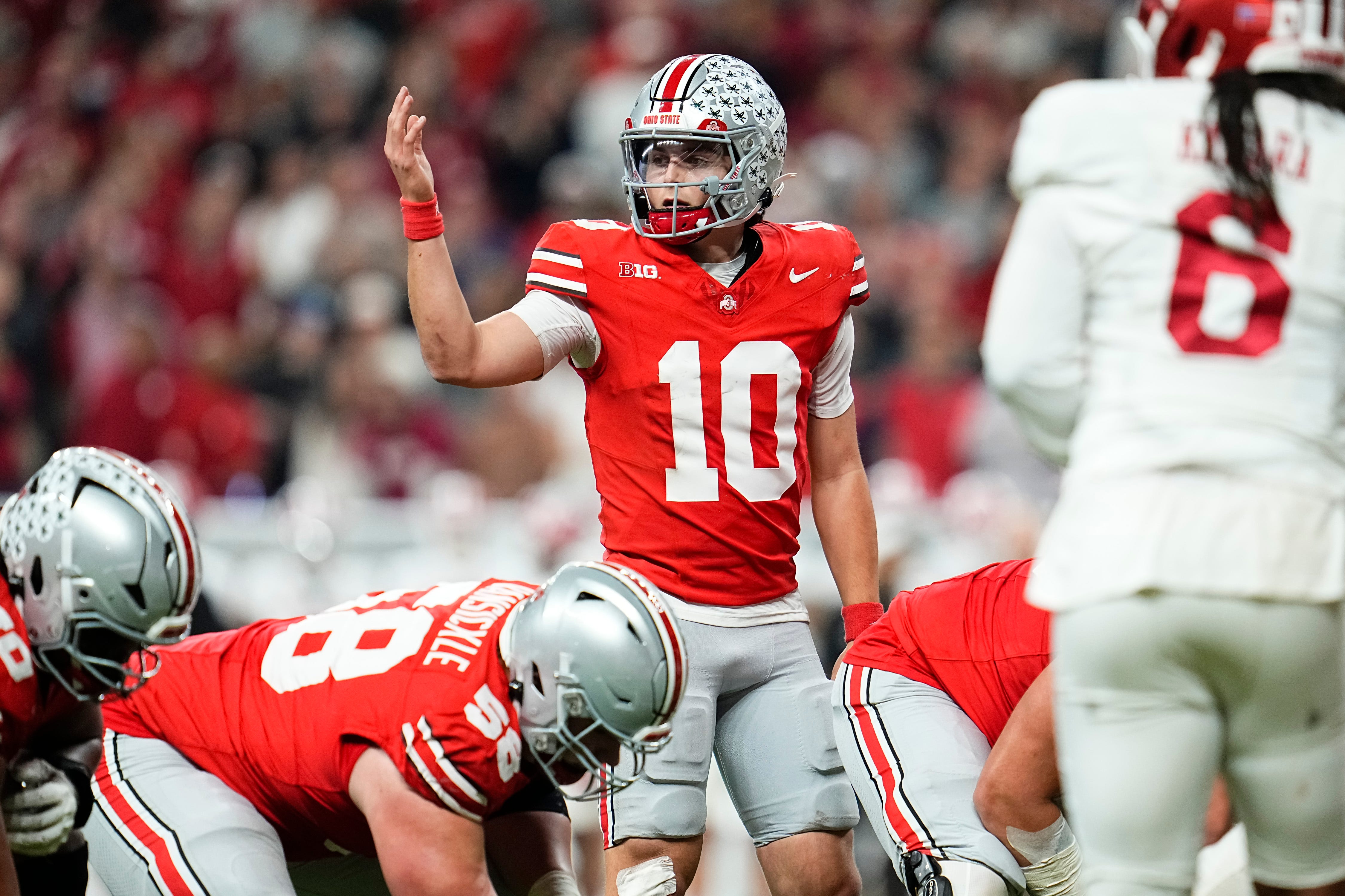 Ohio State Buckeyes quarterback Julian Sayin (10) motions as we break down our College Football Playoff predictions for the CFP quarterfinals this week.