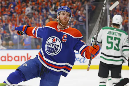 Edmonton Oilers forward Connor McDavid celebrates after scoring a goal as we look at our top Oilers vs. Panthers prediction