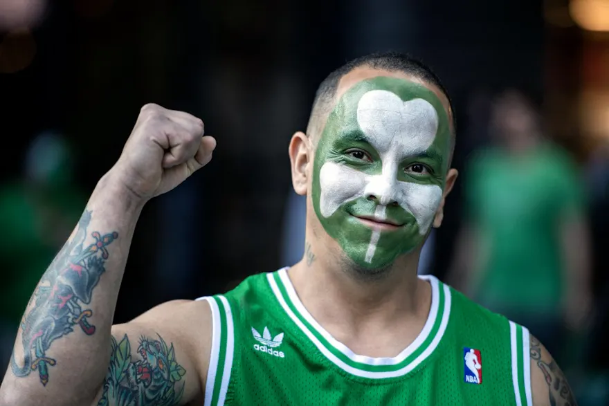 A Boston Celtics fan gestures as he lines up ahead of the NBA Eastern Conference finals game 7 between the Boston Celtics and the Miami Heat as we look at the Massachusetts May sports betting handle