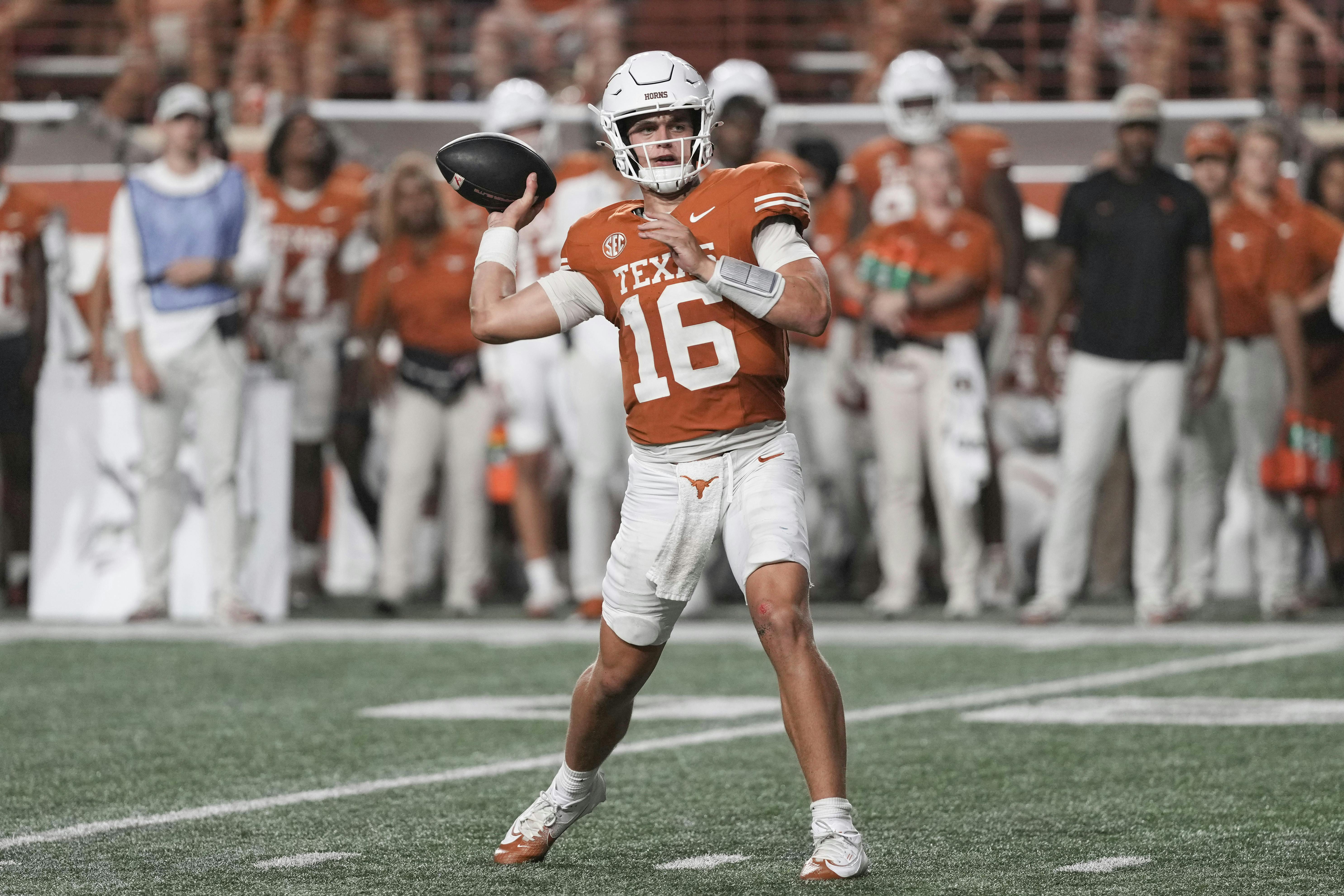 Texas quarterback Arch Manning throws a touchdown against UTSA. The Longhorns