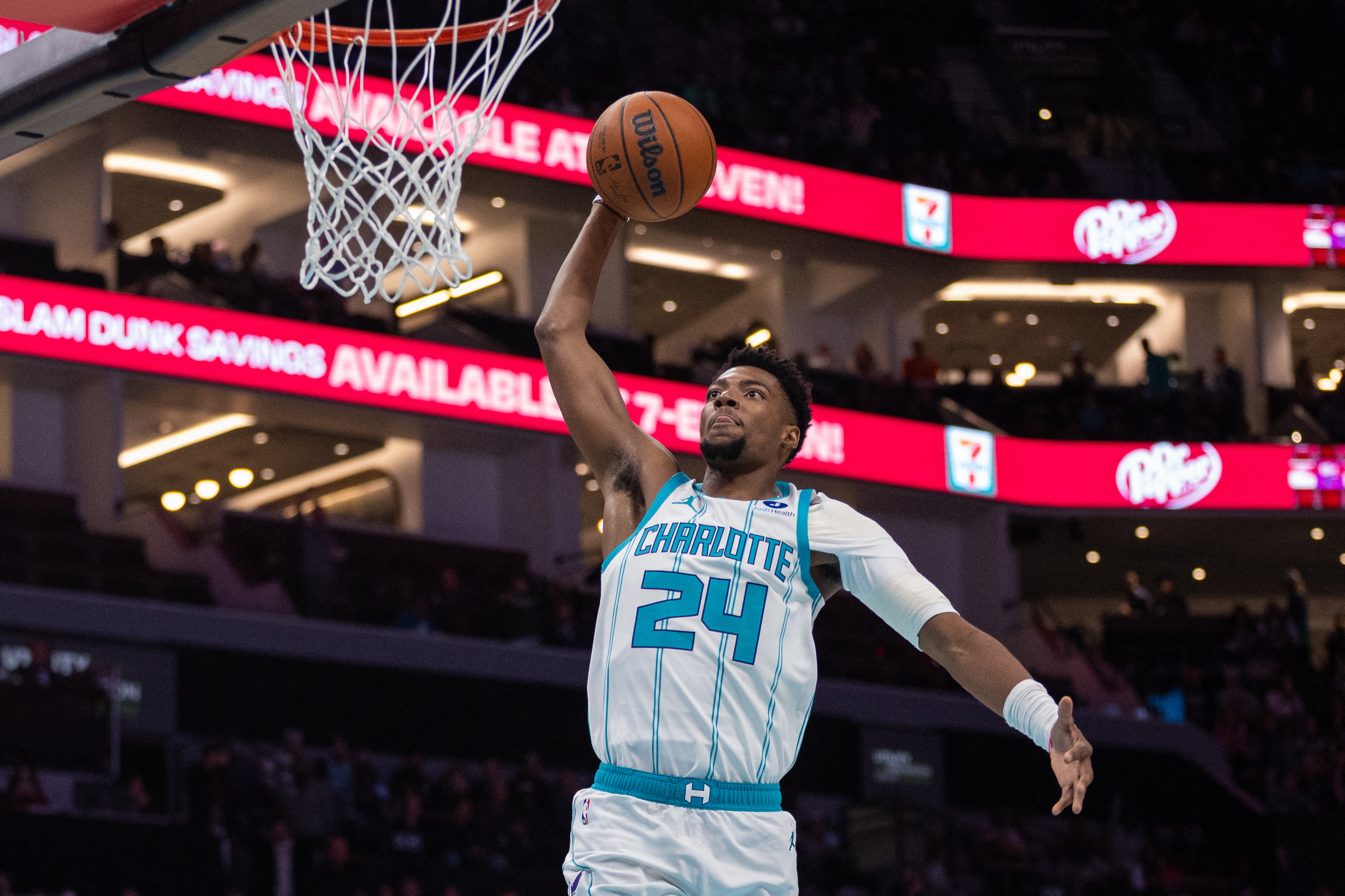 Charlotte Hornets forward Brandon Miller (24) goes to the basket for a dunk. 