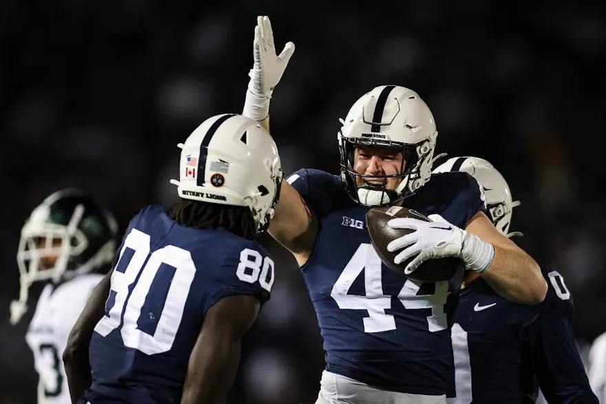 Tyler Warren of the Penn State Nittany Lions celebrates after recovering a fumble on a punt return by against the Michigan State Spartans during the second half at Beaver Stadium on November 26, 2022 in State College, Pennsylvania. 